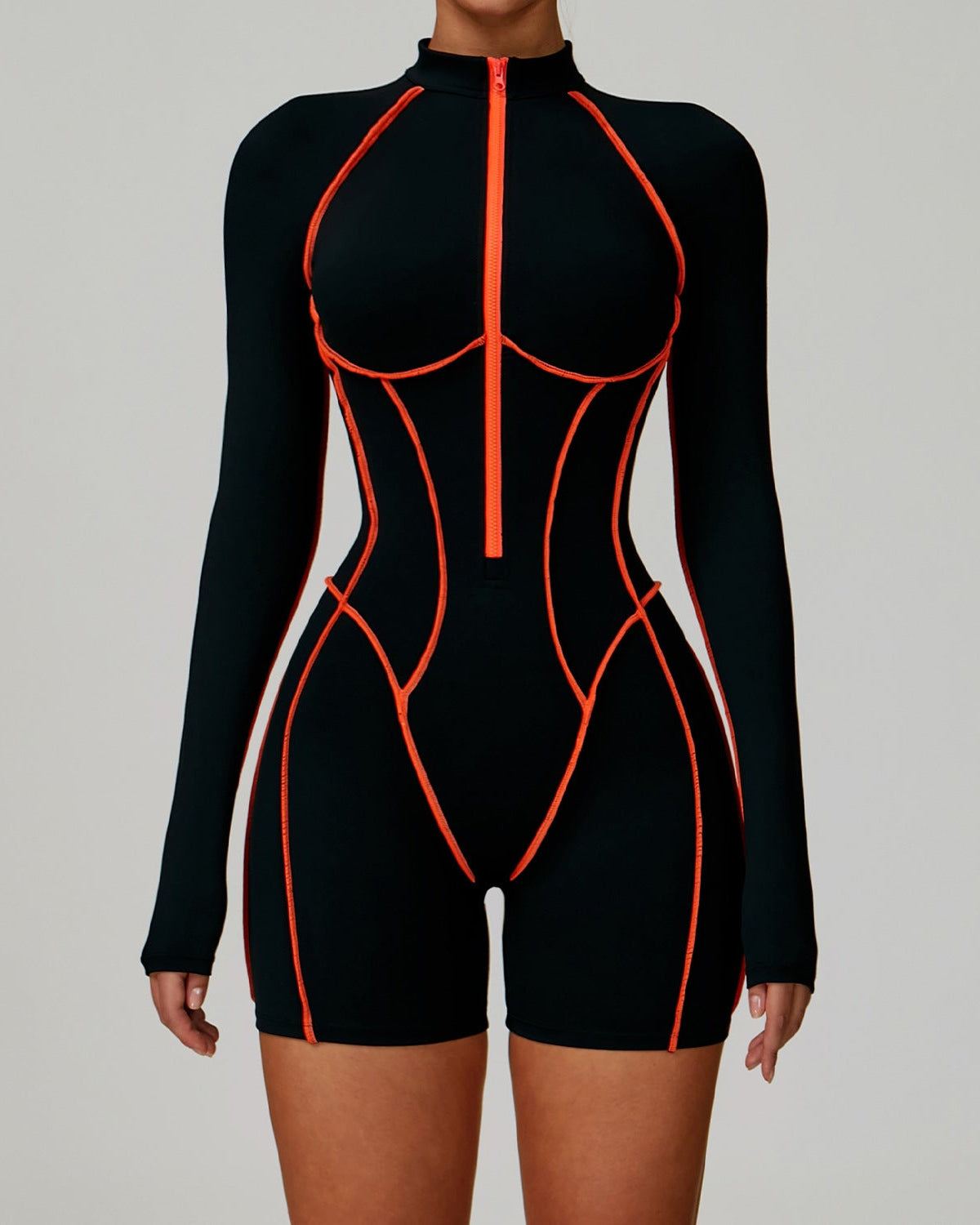 Black bodysuit with orange accents on a gray background