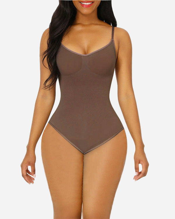 Woman wearing a brown bodysuit on a white background