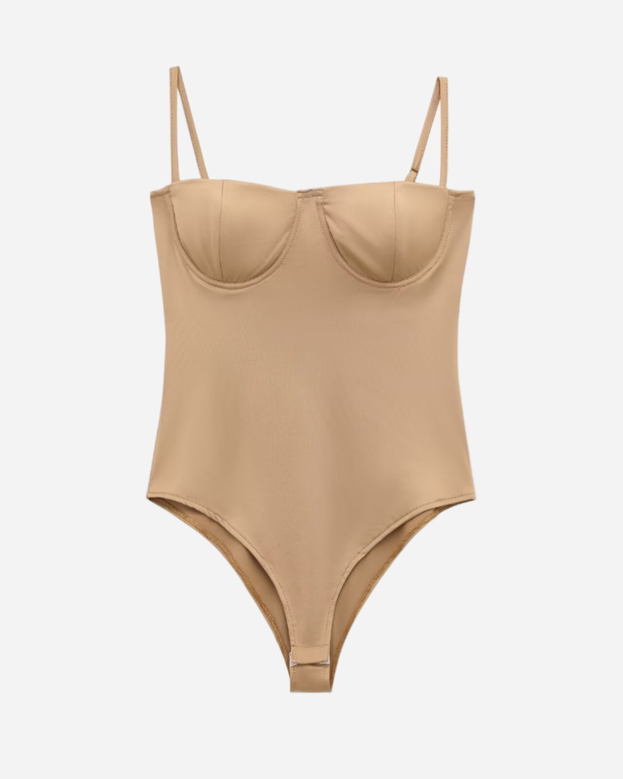 Beige bodysuit with thin straps on a white background