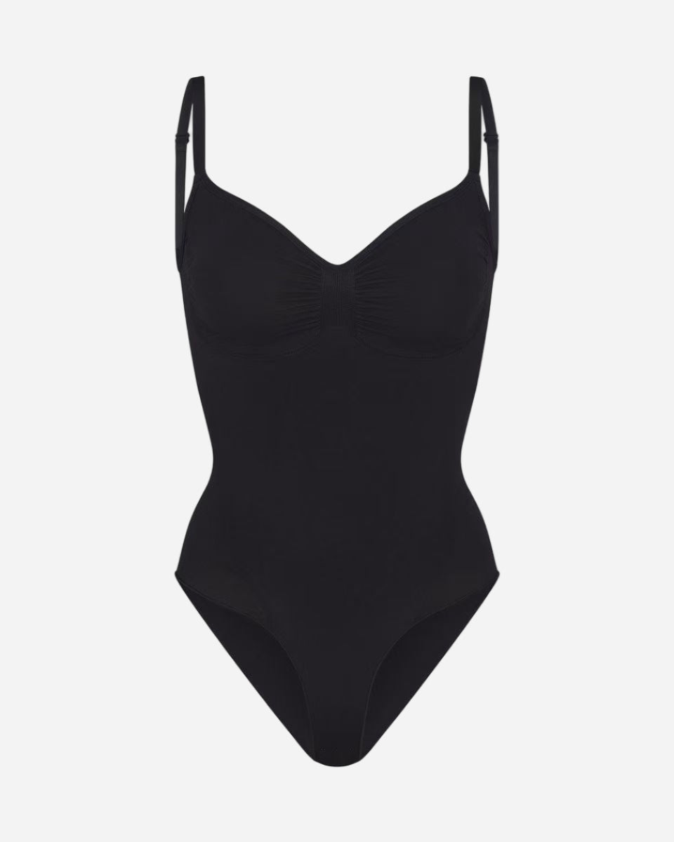 Black swimsuit with thin straps on a white background