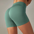 Seamless Stripe Peach Hip-Lift Yoga Shorts – Solid Color Fitness