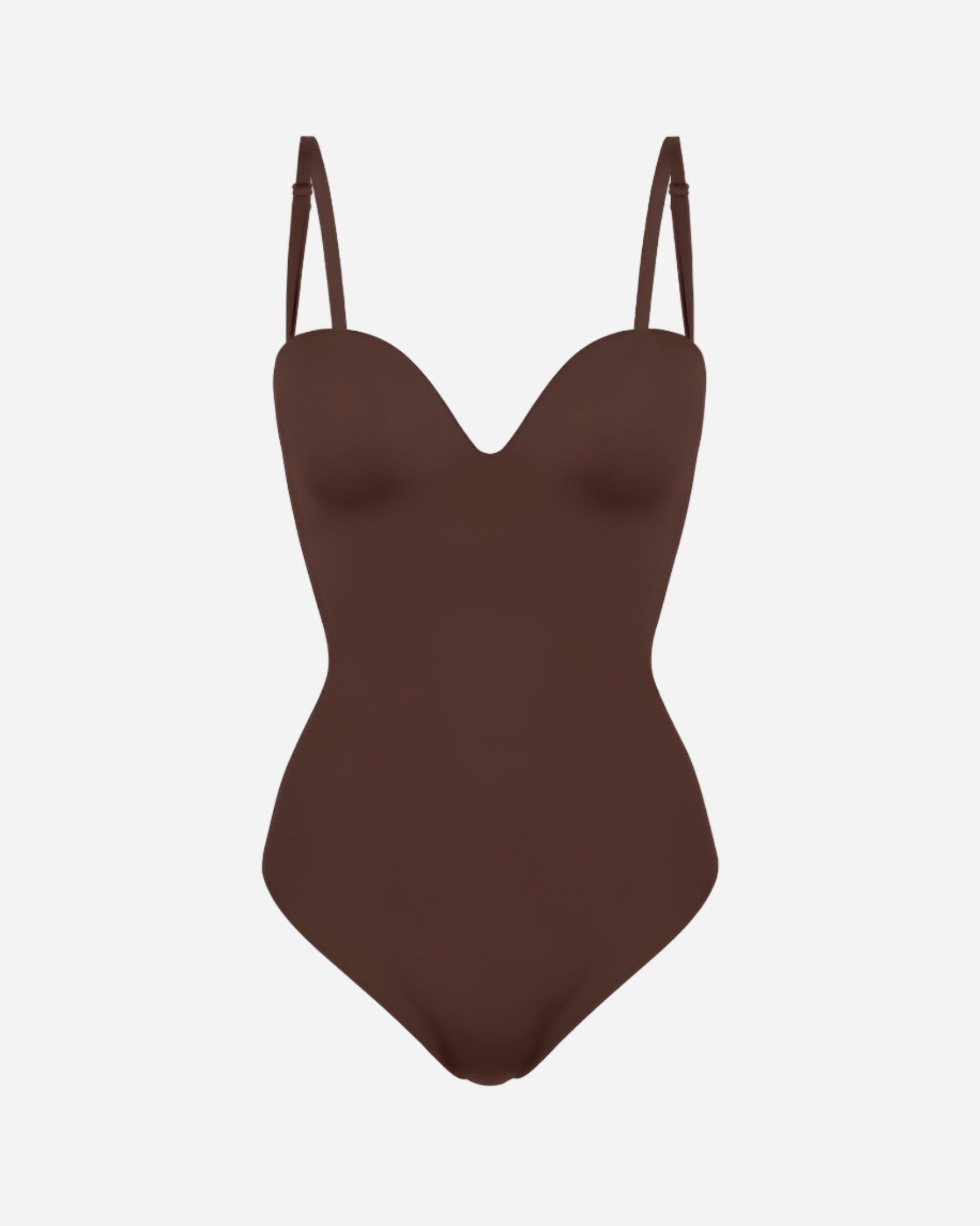 Brown swimsuit with thin straps on a white background